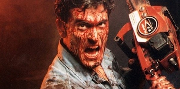 Bloody man holding chainsaw from The Evil Dead