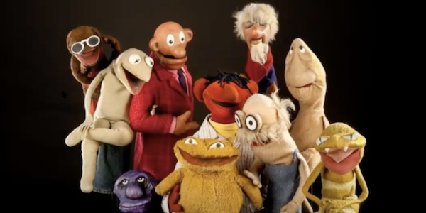 A collection of colorful early puppets created by Jim Henson.