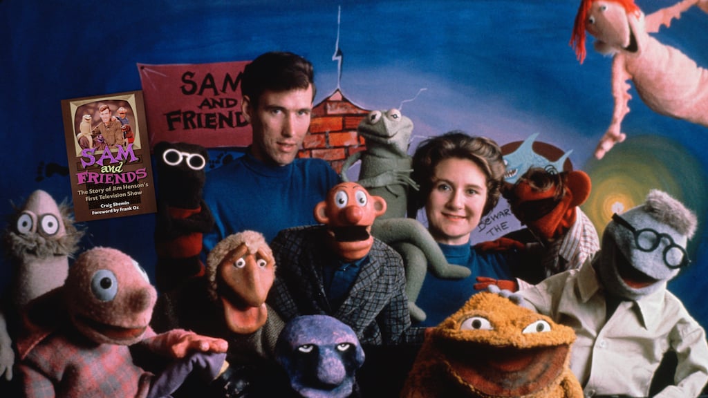 Jim and Jane Henson surrounded by muppets