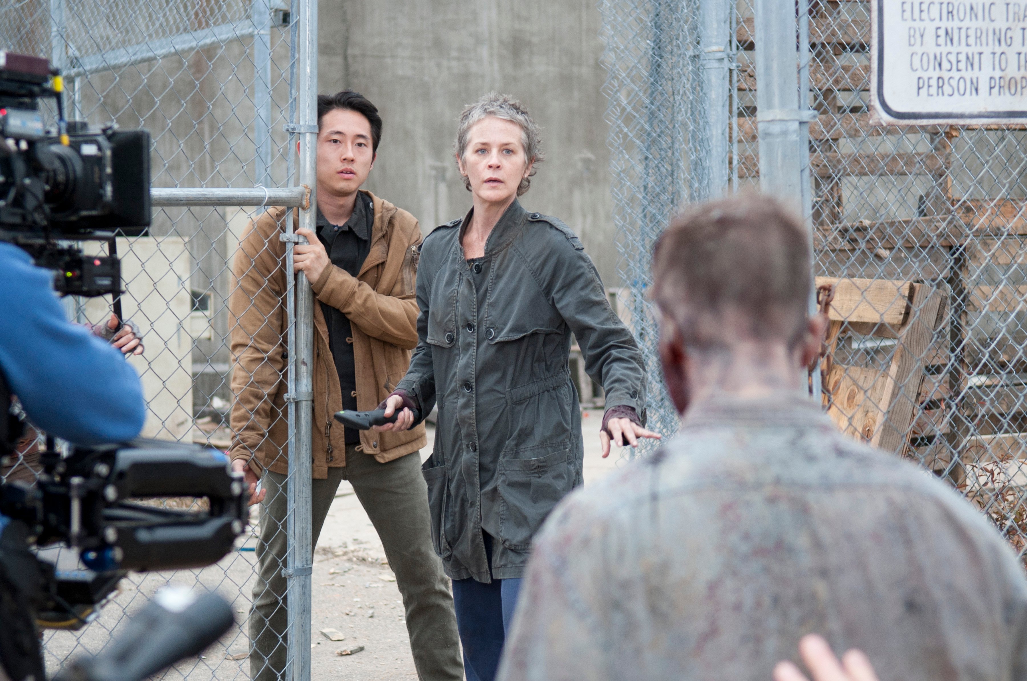 Glenn (Steven Yeun) and Carol (Melissa Suzanne McBride) - The Walking Dead_Season 3, Episode 16_"Welcome to the Tombs" - Photo Credit: Gene Page/AMC